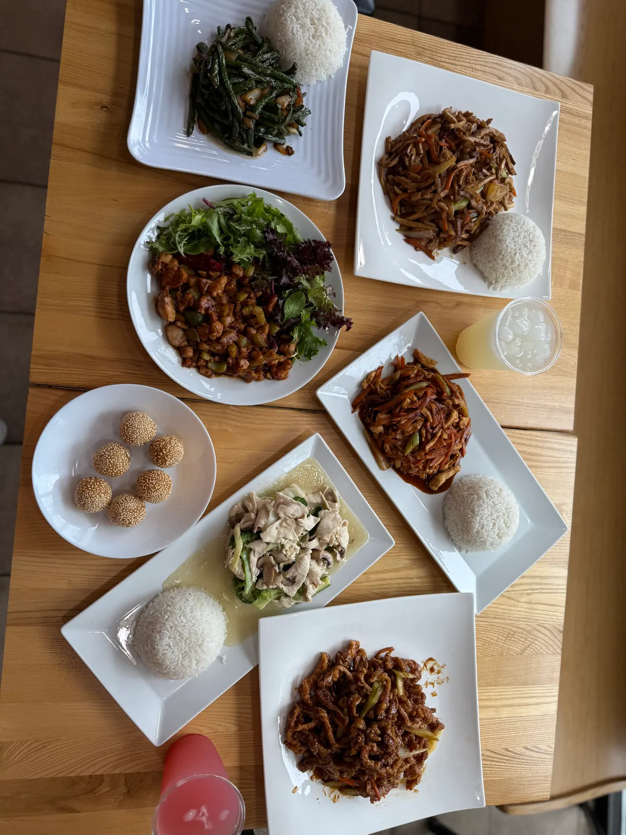 A family-style table of Oriental Cafe dishes